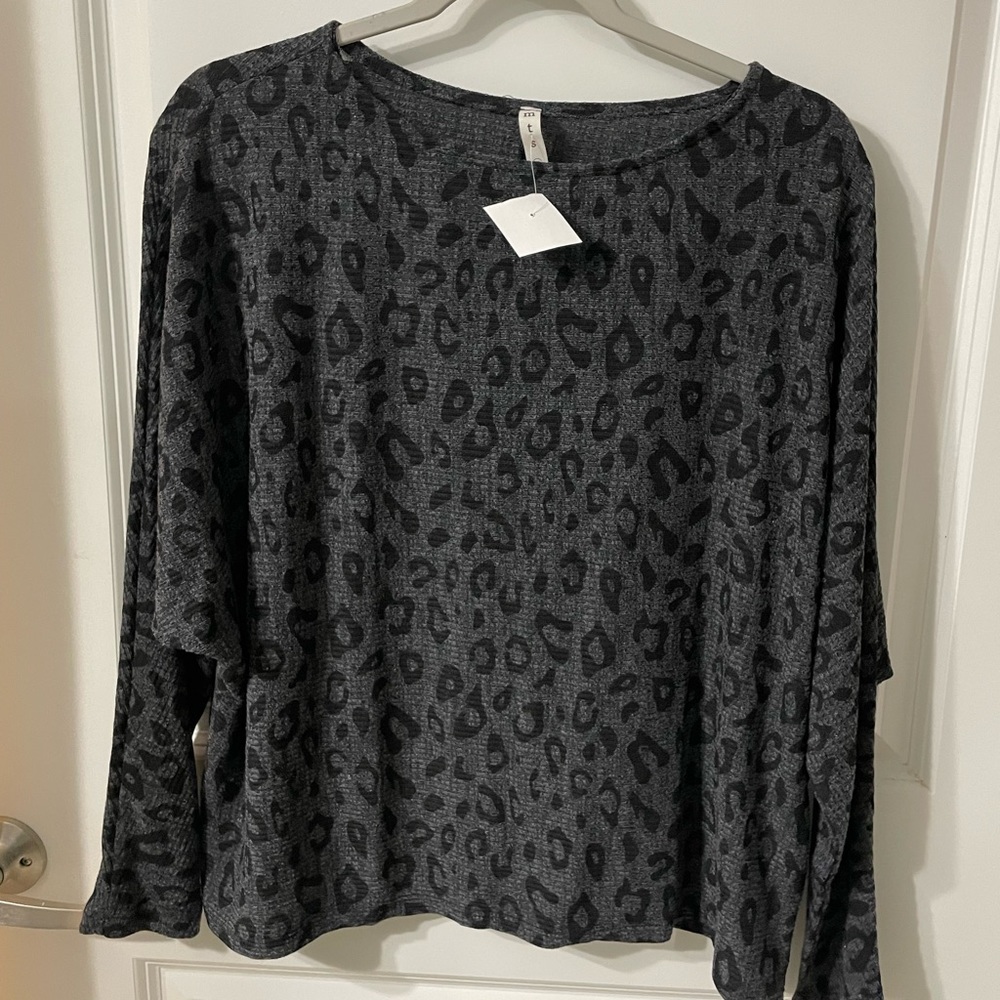 Cheetah Boutique Blouse. New with Tags!